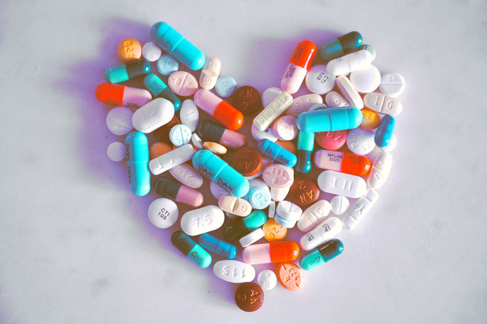 A compiled bunch of pills shaped into a heart